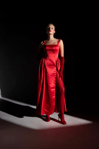 Abito in douchesse lungo con spacco e arriccio sui fianchi